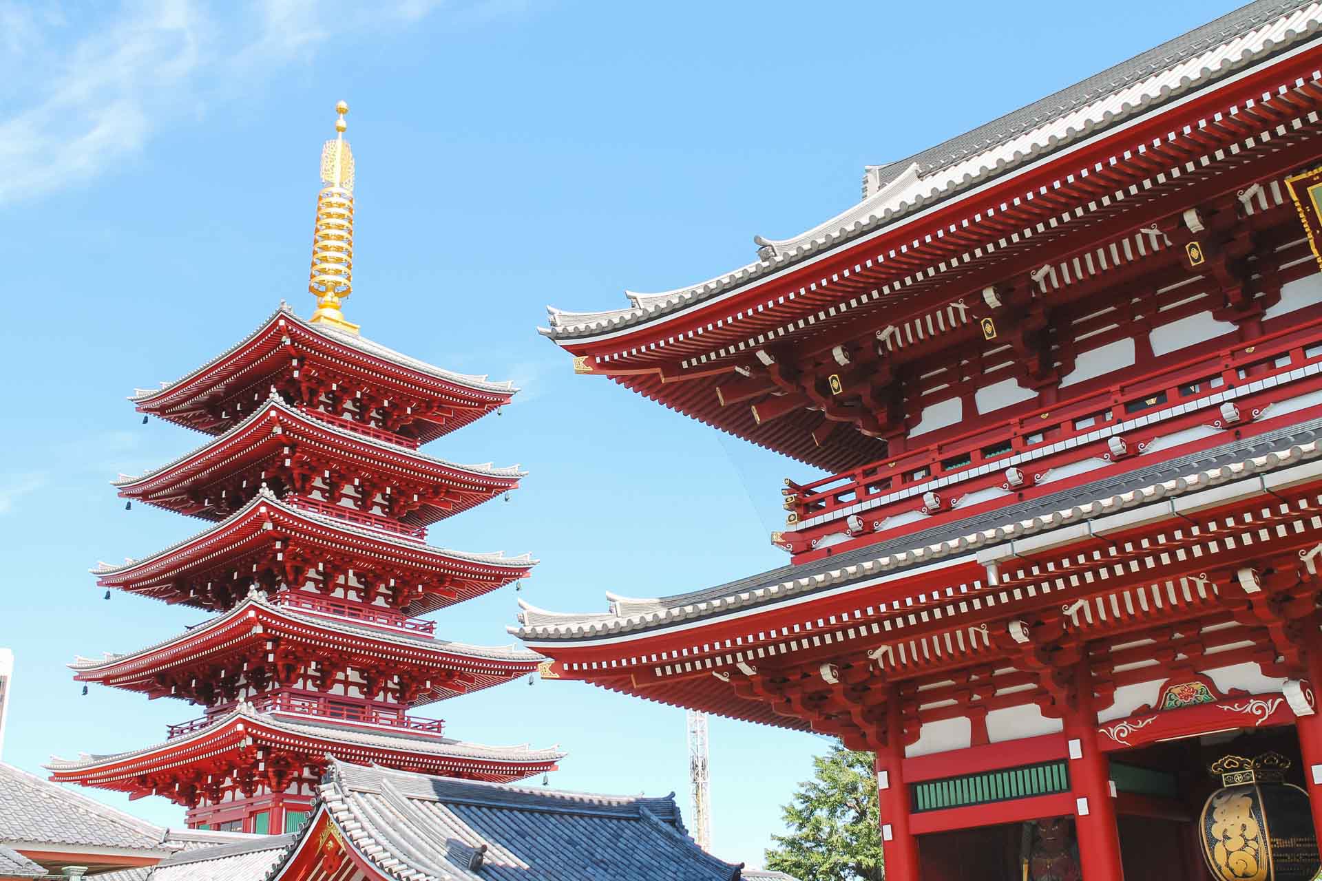 The traditional Japanese red pagoda and temple usually found at Shinto shrines in Japan.
