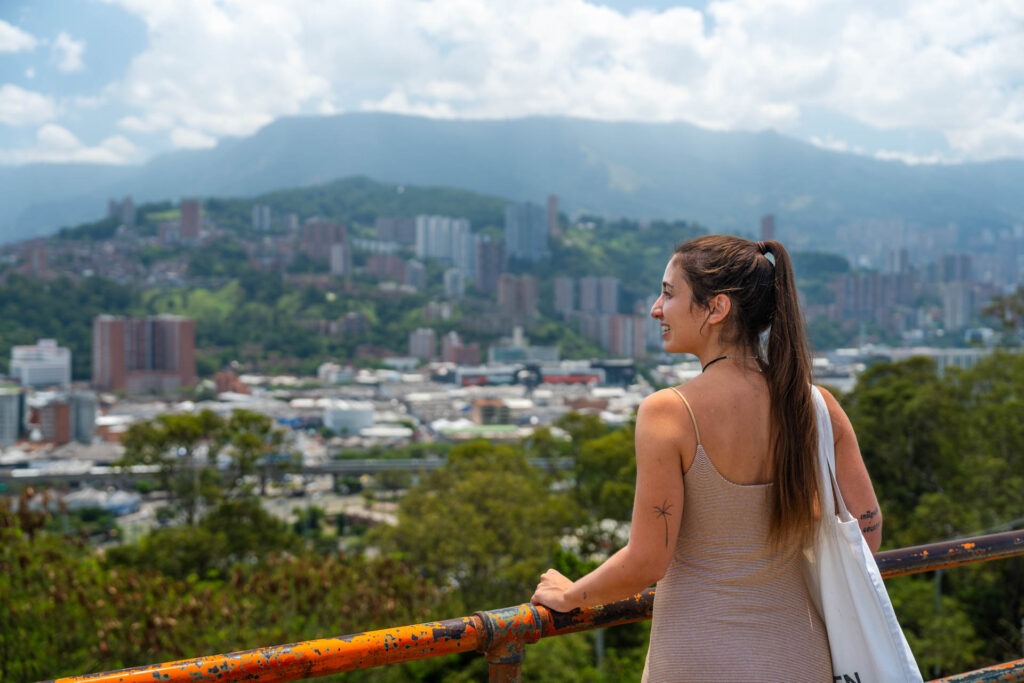 Sara overlooking a view of Medellin city from Pueblito Paisa.
