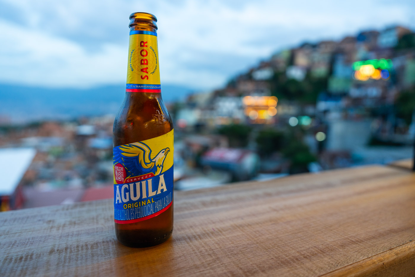 A bottle of Aguila beer, a local Colombian lager, in Comuna 13.