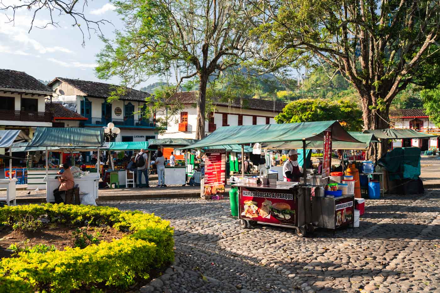 Different food stall on Plaza de Libertador in Jardin, Colombia.