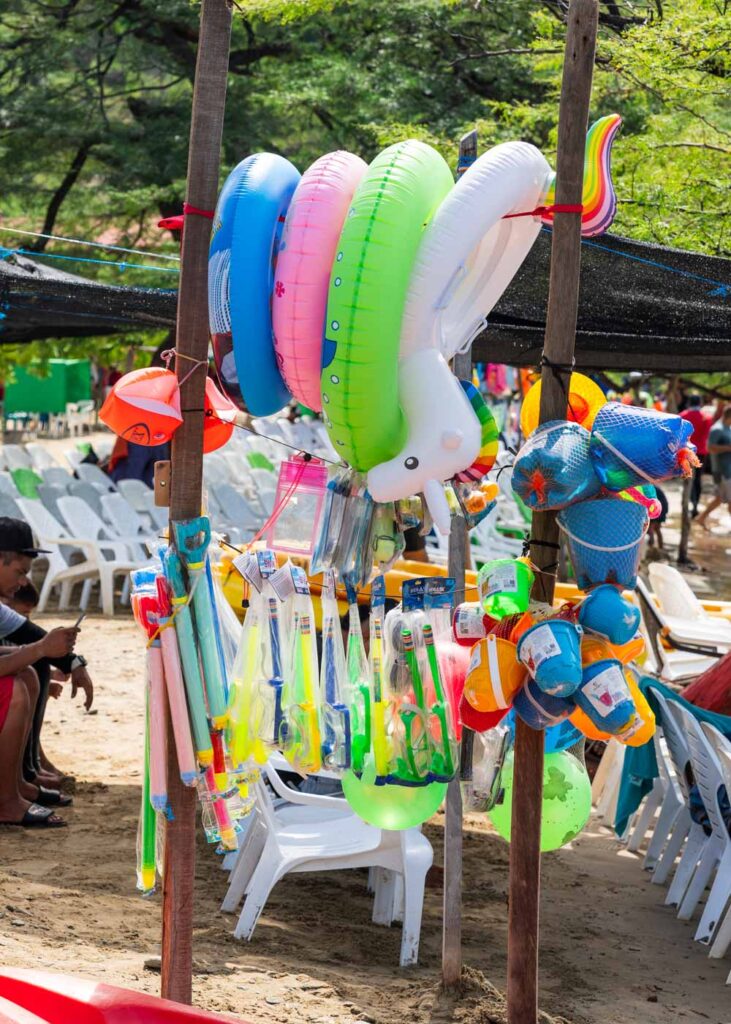Snorkels, inflatables and buckets for sale at Playa Grande.