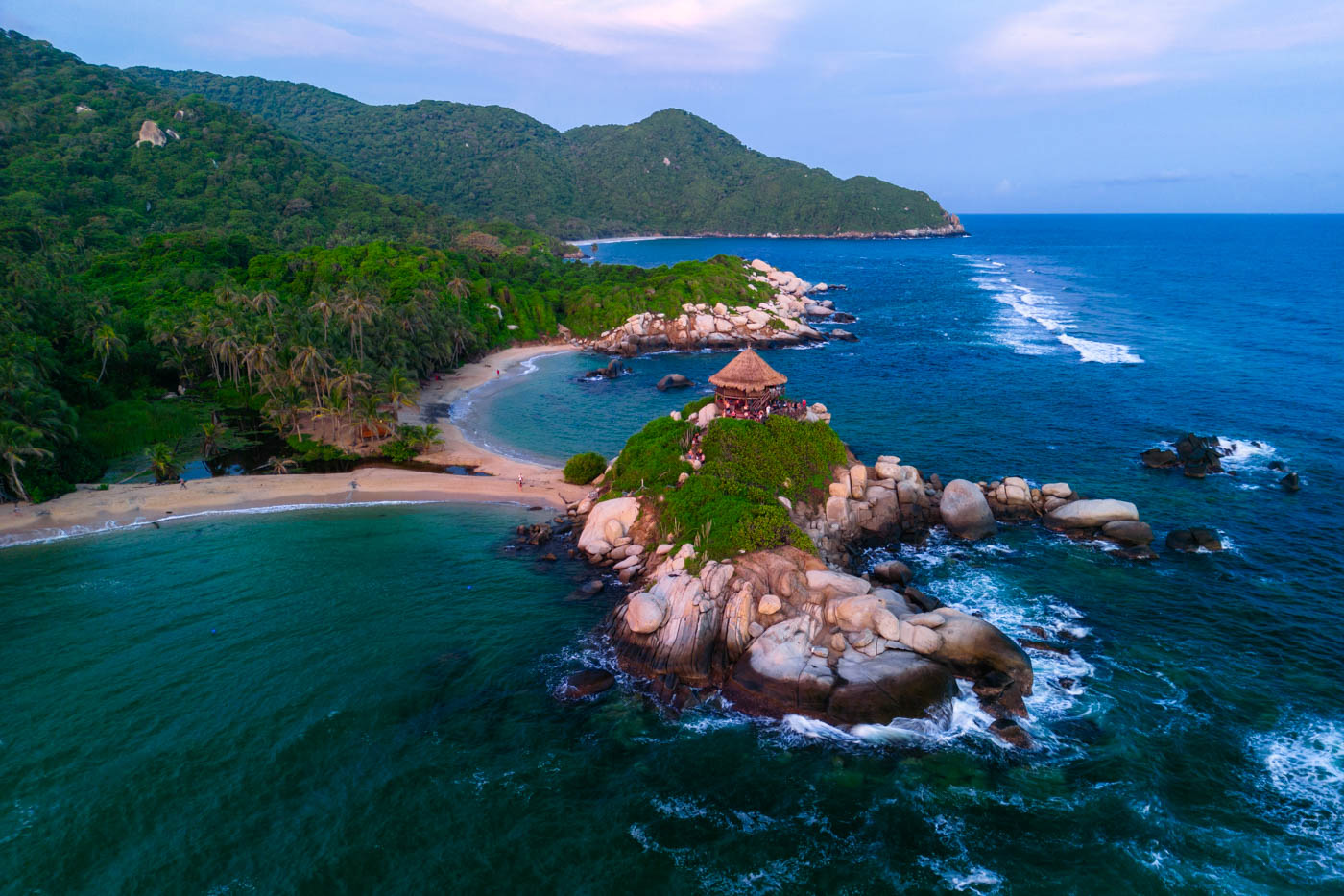 Mirador tower at Cabo San Juan perched on a rocky outcrop at sunrise with views over Tayrona National Park.