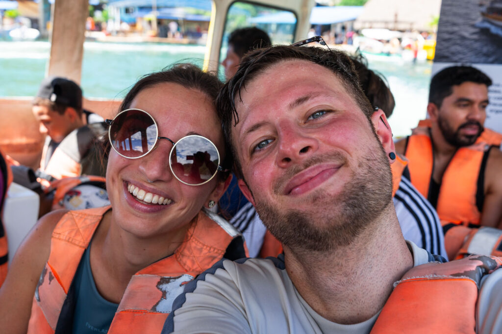 A selfie of Sara and Ryan on a taxi-boat.