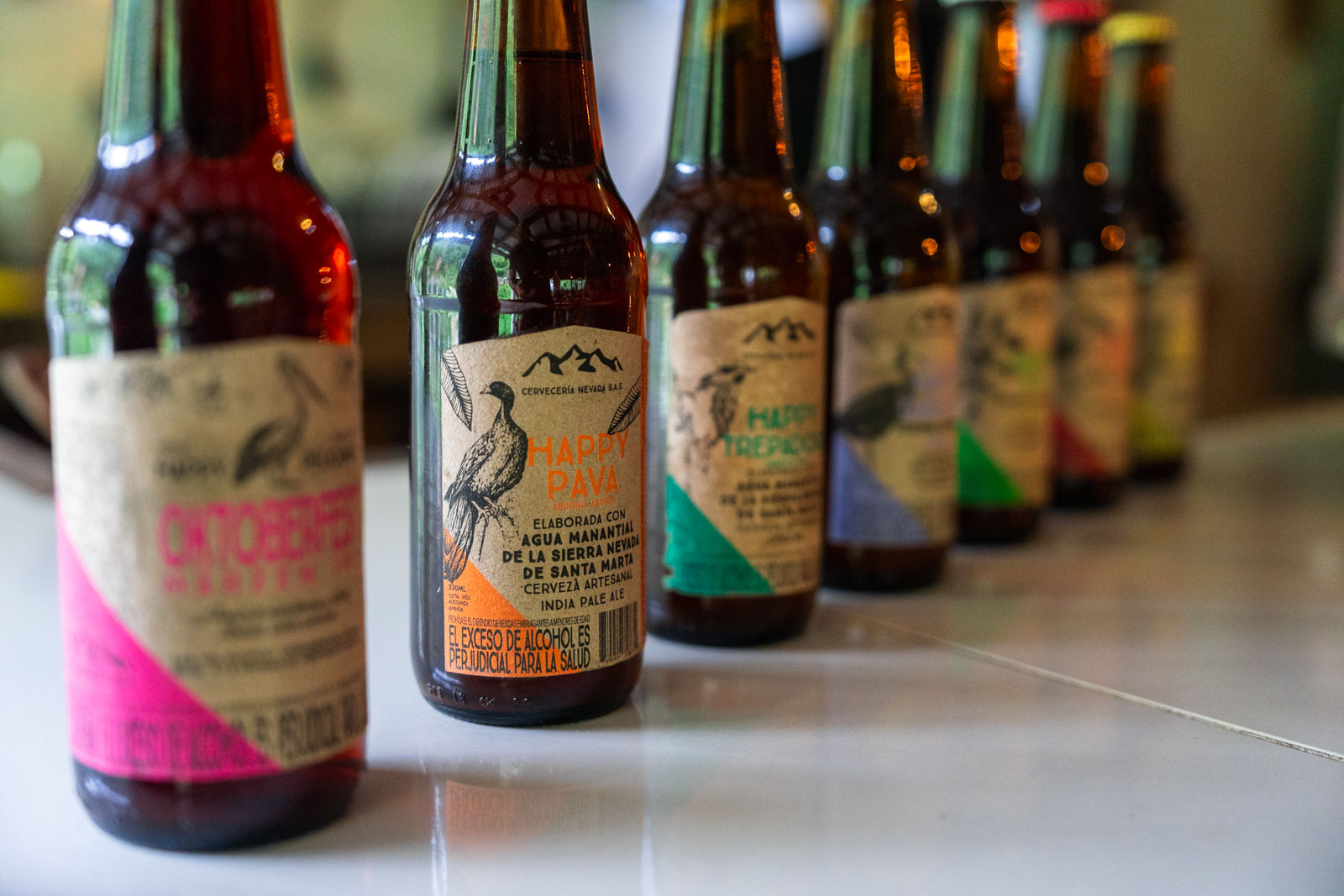 A line up of craft beer bottle from Nevada Cerveceria in Minca.