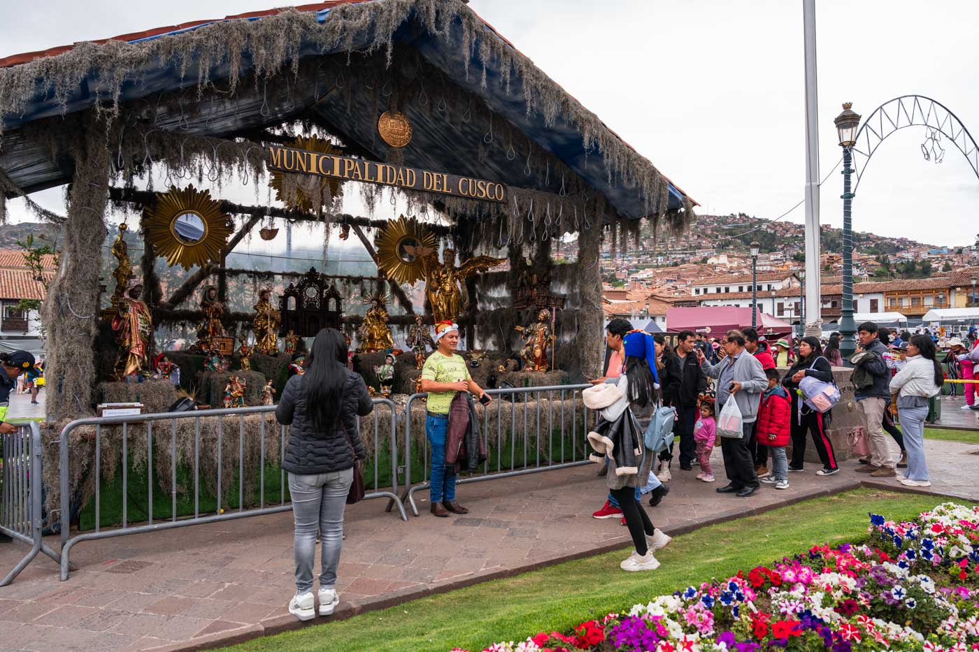 People queueing up at the giant nativity scene in Plaza de Armas in Cusco.